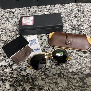 100% authentic and genuine Persol PO3192S 1010Q8 sunglasses. Gold-Polarized Grey